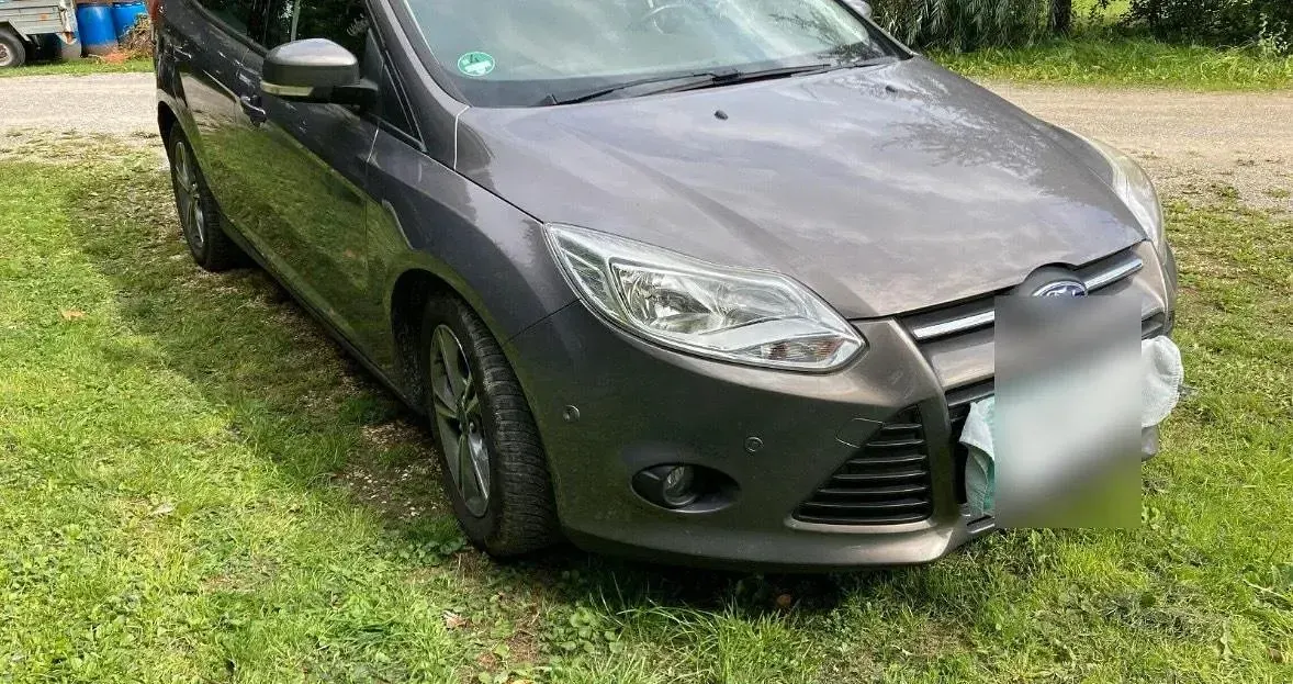 Używany Ford Focus 125 KM (91 kW) 2014 Szary Kombi