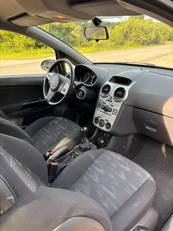 Gebraucht Opel Corsa Satellite 87 PS (63 kW) 2011 Grau Kleinwagen
