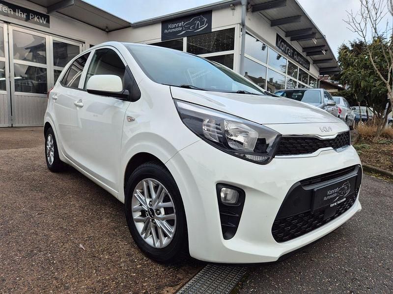 Weiß Gebraucht 2021 Kia Picanto DREAM-TEAM Edition Kleinwagen | 11.900 € (Fairer Preis) - Bild 1/4