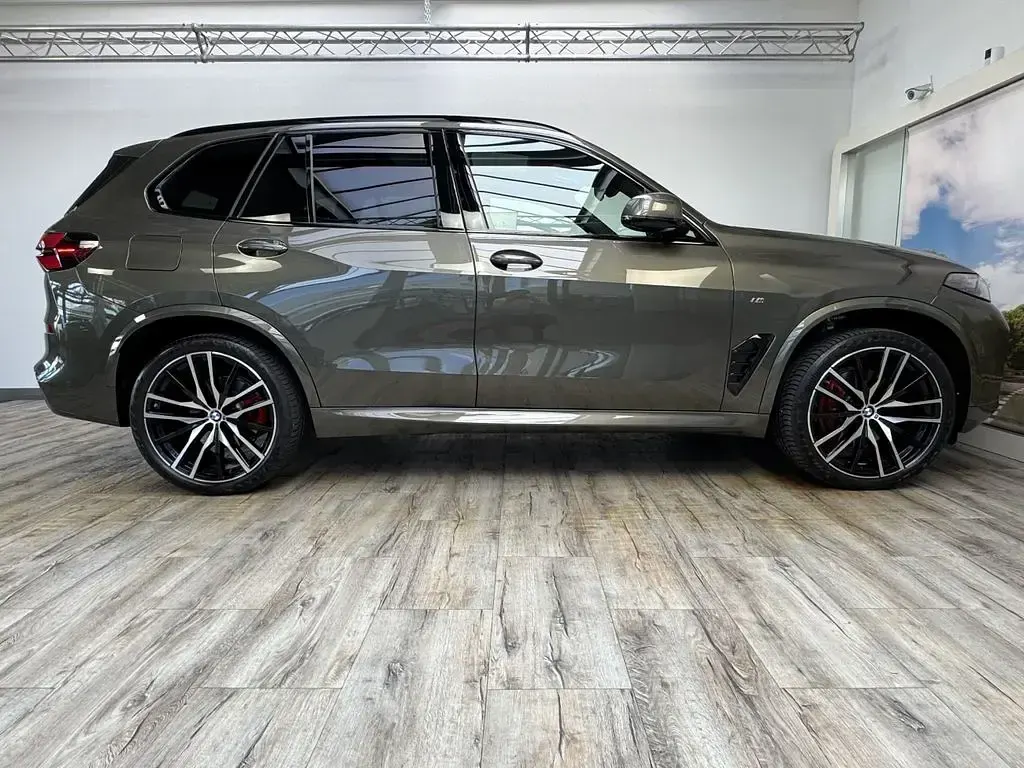 Gebraucht BMW X5 M Sport 298 PS (219 kW) 2025 (0c3d) manhattan green metallic SUV