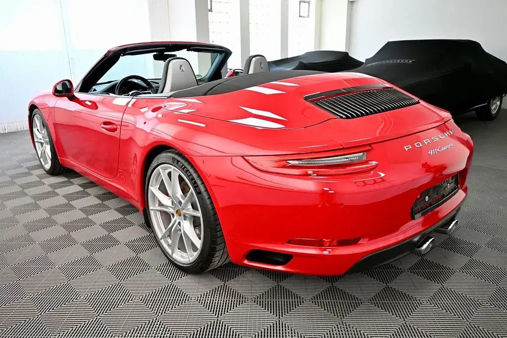 Gebraucht Porsche 911 Carrera Cabriolet 370 PS (272 kW) 2017 Karminrot Cabrio