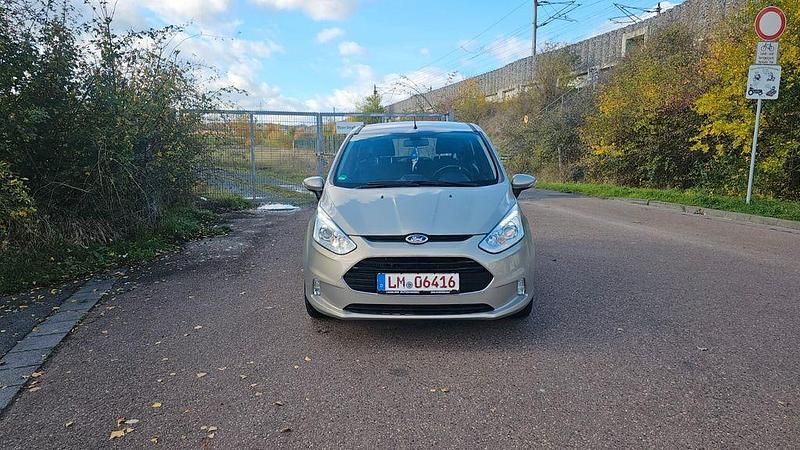 Grau Gebraucht 2013 Ford B-MAX Titanium Van / Kleinbus | 5.999 € (Fairer Preis) - Bild 1/4