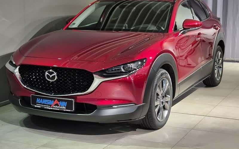 Soul red crystal metallic Gebraucht 2024 Mazda CX-30 Exclusive-Line SUV | 31.990 € (Etwas zu teuer) - Bild 1/4