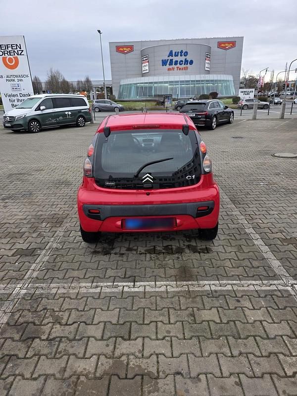 Second-hand Citroën C1 68 CP (50 kW) 2006 Roșu Hatchback