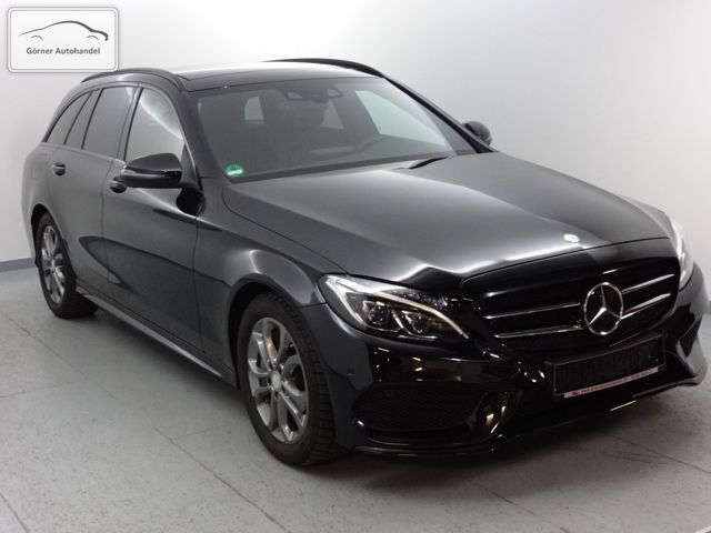 Schwarz metallic Gebraucht 2015 Mercedes C250 AMG line Kombi | 28.700 € (Teuer) - Bild 1/4