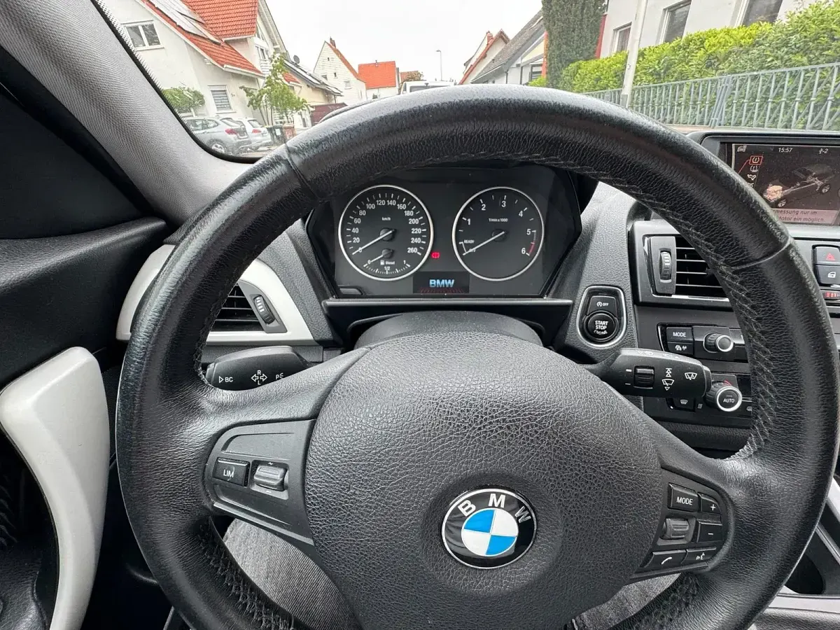 Second-hand BMW 116 120 CP (88 kW) 2013 Negru Hatchback