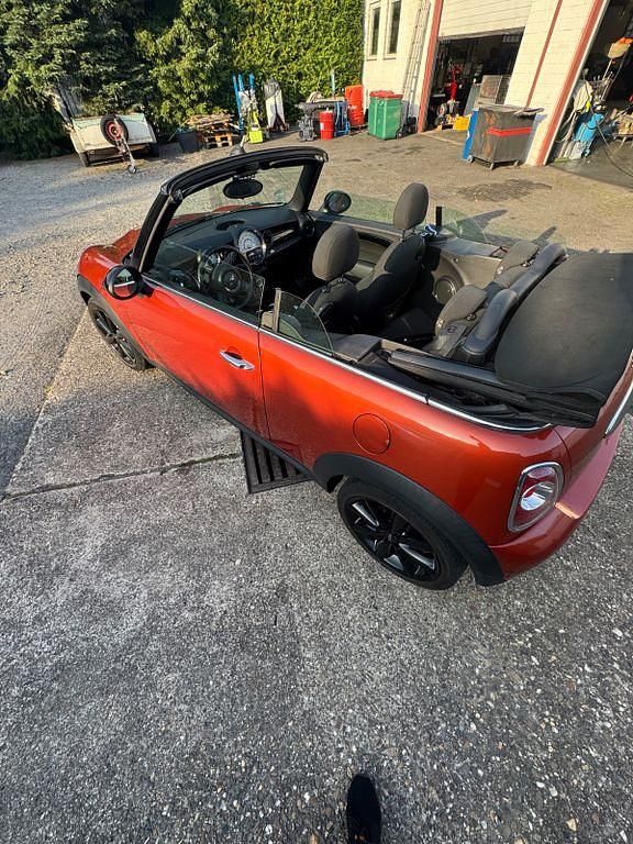 Gebraucht Mini Cooper Cabriolet 122 PS (89 kW) 2011 Orange Cabrio