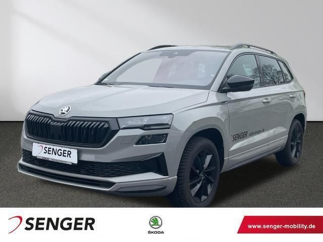 Steelgrau Gebraucht 2023 Skoda Karoq SportLine SUV | 38.990 € (Teuer) - Bild 1/4
