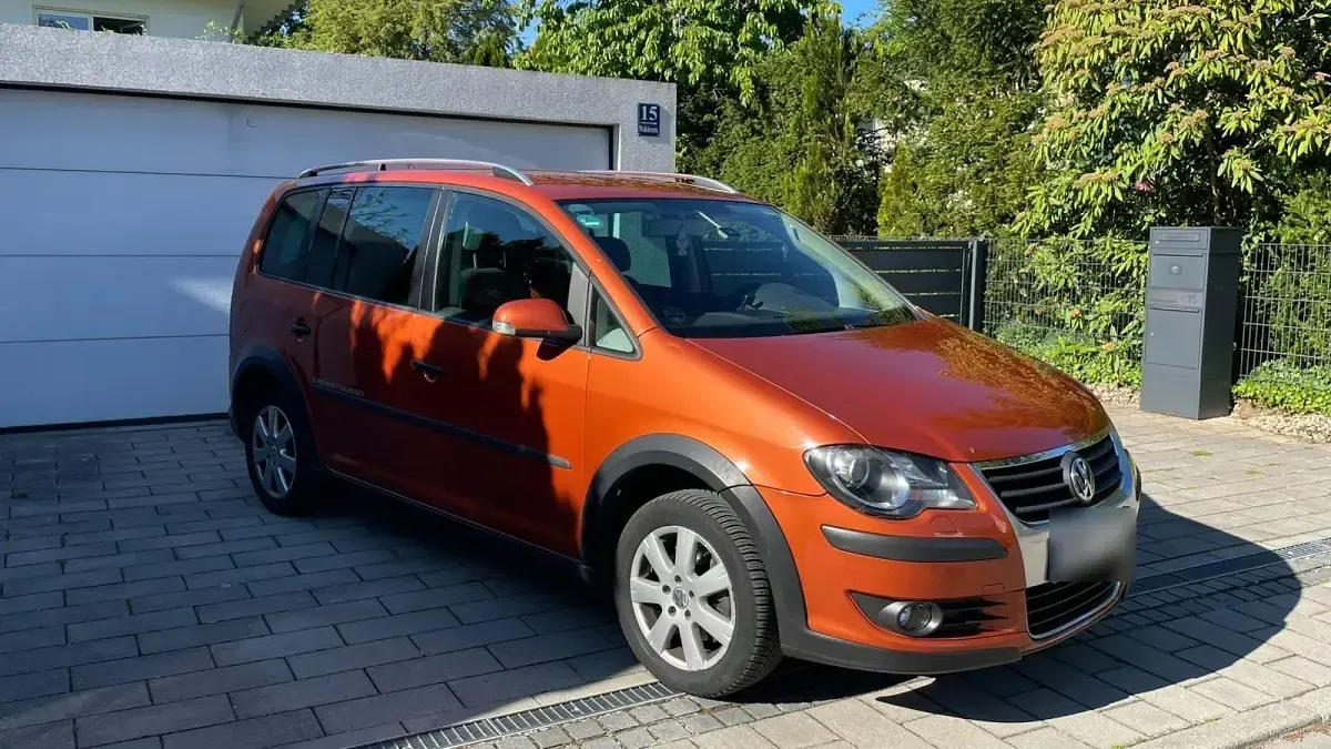 Używany VW Touran Cross 170 KM (125 kW) 2007 Pomarańczowy Minivan