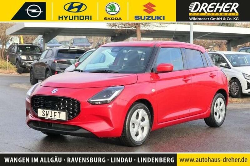 Burning red pearl metallic Neu 2025 Suzuki Swift Comfort Kleinwagen | 19.890 € - Bild 1/3