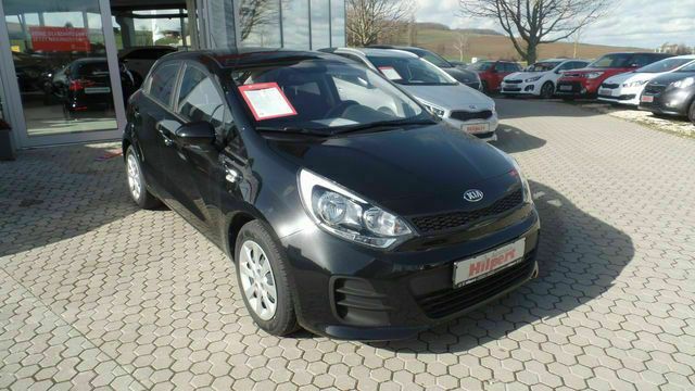 Gebraucht Kia Rio Attract 84 PS (61 kW) 2015 Schwarz metallic Kleinwagen