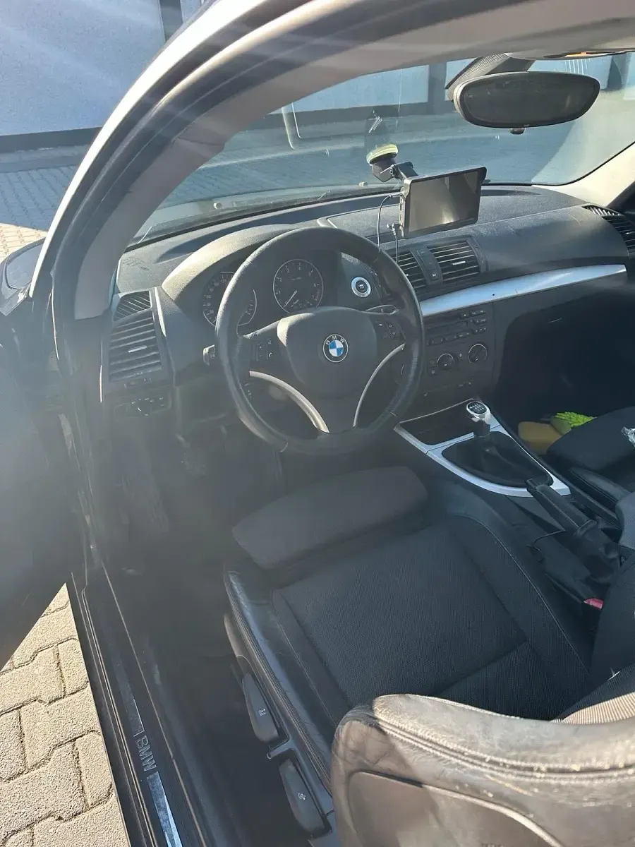 Gebraucht BMW 116 122 PS (89 kW) 2008 Schwarz Kleinwagen