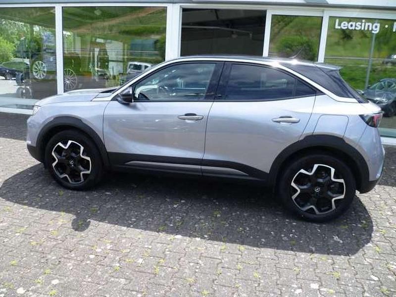 Gebraucht Opel Mokka Ultimate 131 PS (96 kW) 2021 Kontrast grau/quarz silber (metallic) SUV
