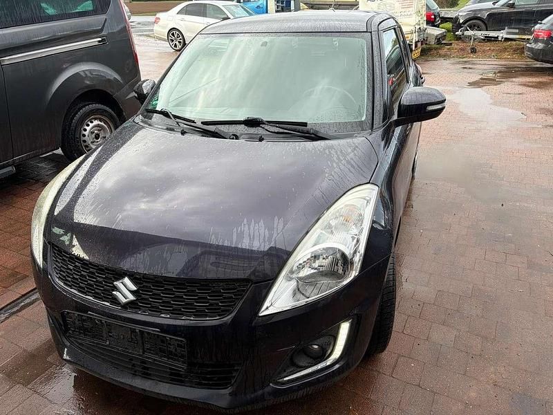 Gebraucht Suzuki Swift Club 94 PS (69 kW) 2014 Schwarz Kleinwagen