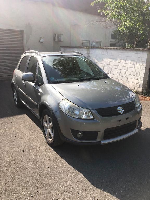 Grau Gebraucht 2007 Suzuki SX4 S-Cross SUV | 1.999 € - Bild 1/4