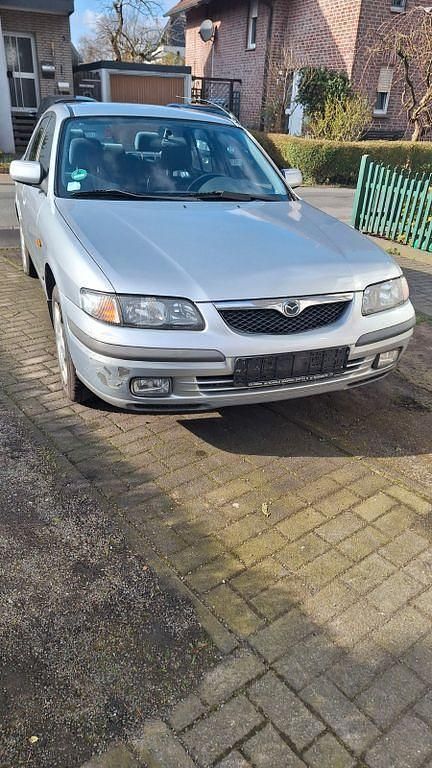 Silber Gebraucht 1997 Mazda 626 Limousine | 900 € - Bild 1/4