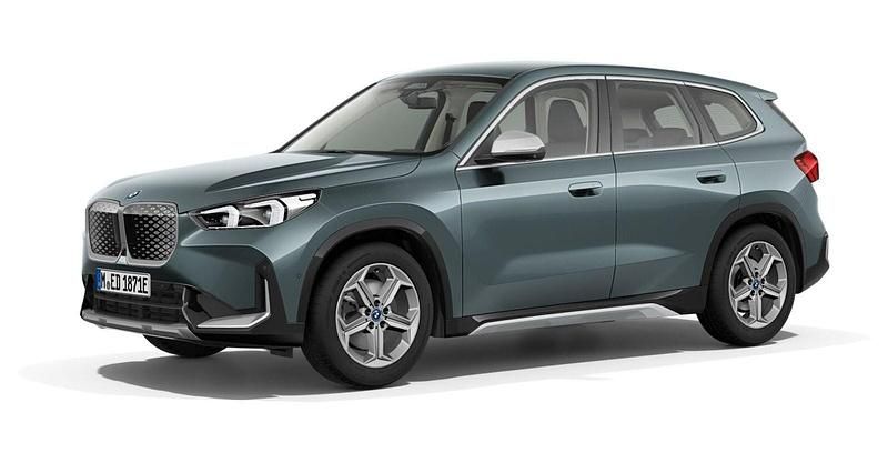 Grün Gebraucht 2023 BMW iX1 Luxury Line SUV | 42.380 € (Etwas zu teuer) - Bild 1/4