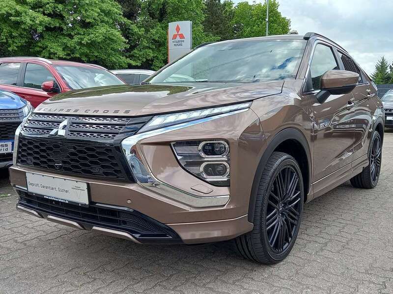 Bronzebraun (m) Gebraucht 2023 Mitsubishi Eclipse Cross Plus SUV | 25.990 € (Fairer Preis) - Bild 1/4
