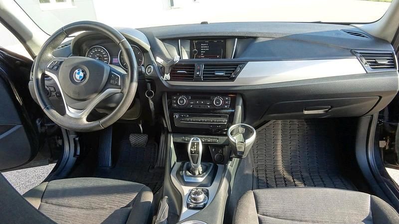 Second-hand BMW X1 143 CP (105 kW) 2014 Negru SUV