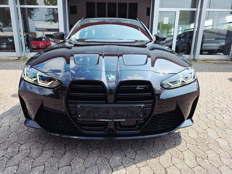 Black sapphire metallic Gebraucht 2024 BMW M3 Competition Edition Kombi | 87.465 € (Guter Preis) - Bild 1/4