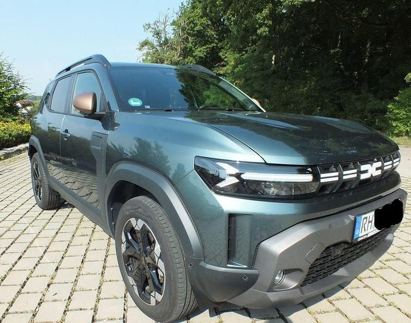 Grün Gebraucht 2024 Dacia Duster Extreme SUV | 25.490 € (Superpreis) - Bild 1/4