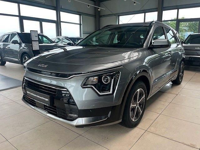Grau Gebraucht 2024 Kia Niro Vision SUV | 28.290 € (Superpreis) - Bild 1/4