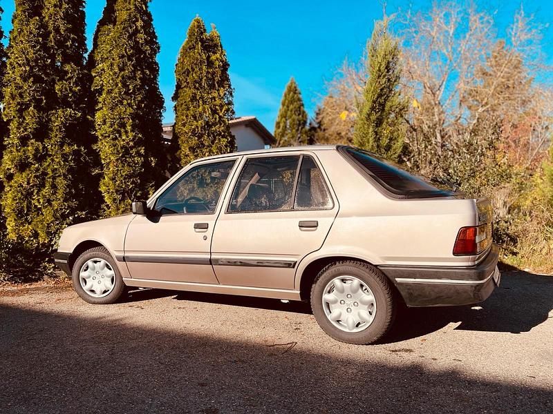 Gebraucht Peugeot 309 75 PS (55 kW) 1989 Beige Kleinwagen