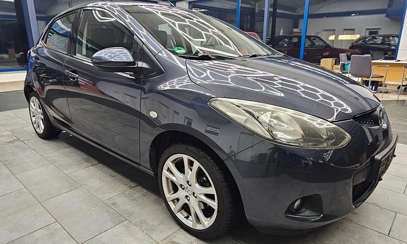 Grau Gebraucht 2009 Mazda 2 Kleinwagen | 3.590 € (Fairer Preis) - Bild 1/4