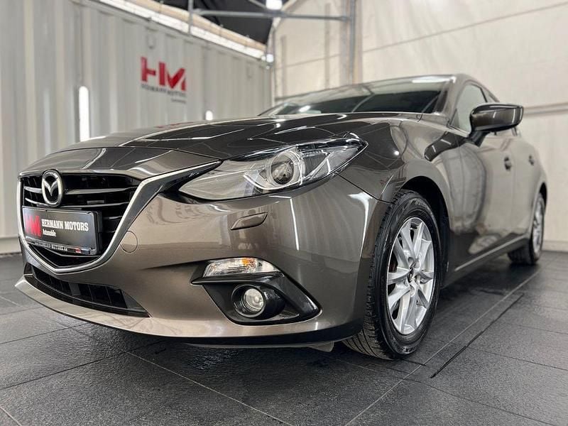 Grau Gebraucht 2013 Mazda 3 Center-Line Limousine | 9.747 € (Fairer Preis) - Bild 1/4