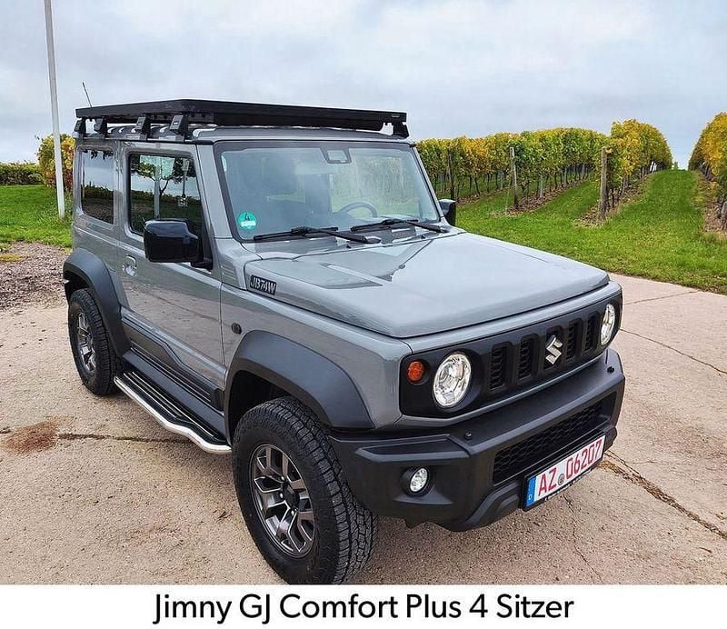 Grau Gebraucht 2020 Suzuki Jimny Comfort+ SUV | 29.990 € (Fairer Preis) - Bild 1/4