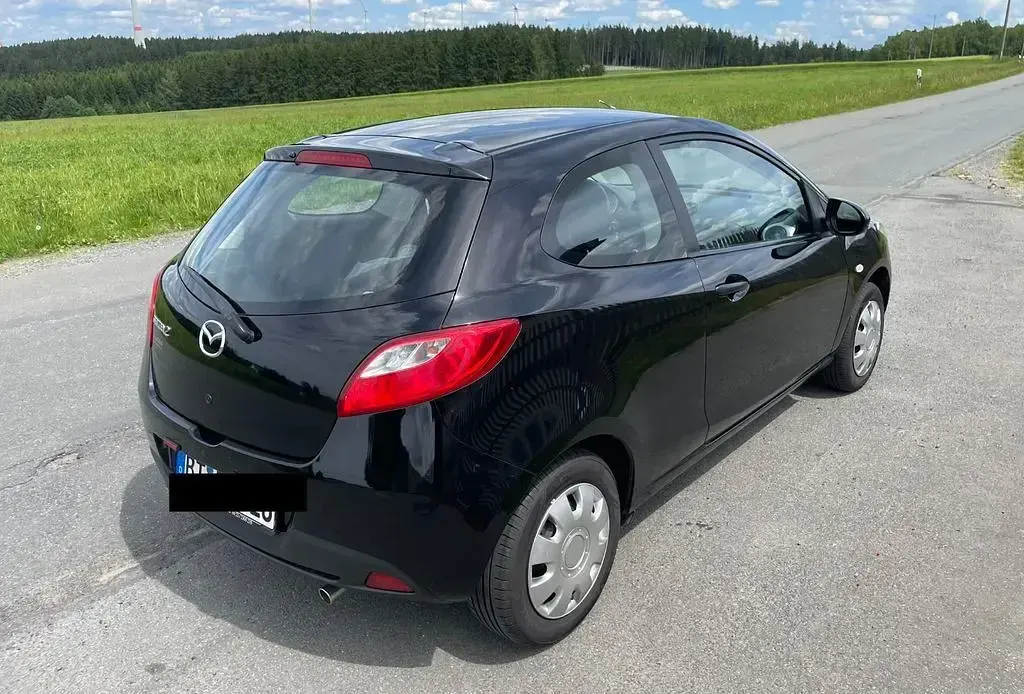 Gebraucht Mazda 2 Impuls 75 PS (55 kW) 2009 Schwarz Kleinwagen