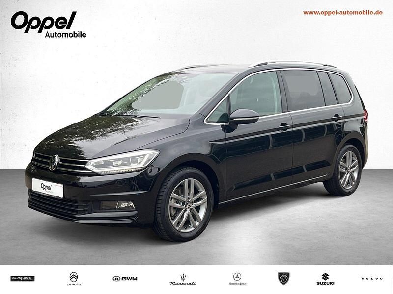 Deep black perleffekt Gebraucht 2024 VW Touran Comfortline Van / Kleinbus | 34.999 € (Fairer Preis) - Bild 1/3