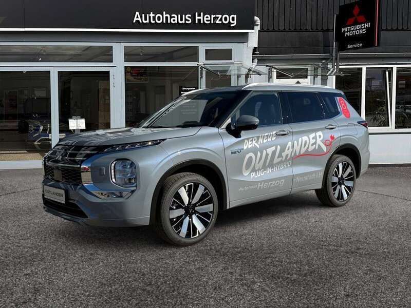 Grau (mondstein grau) Neu 2025 Mitsubishi Outlander P-HEV Top SUV | 54.281 € (Etwas zu teuer) - Bild 1/4