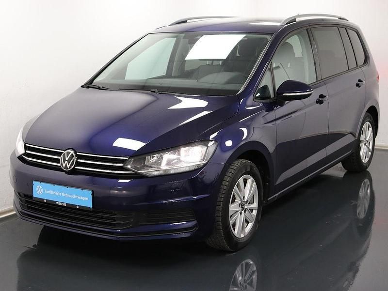 Atlantik blue Gebraucht 2024 VW Touran Comfortline Van / Kleinbus | 32.985 € (Fairer Preis) - Bild 1/4