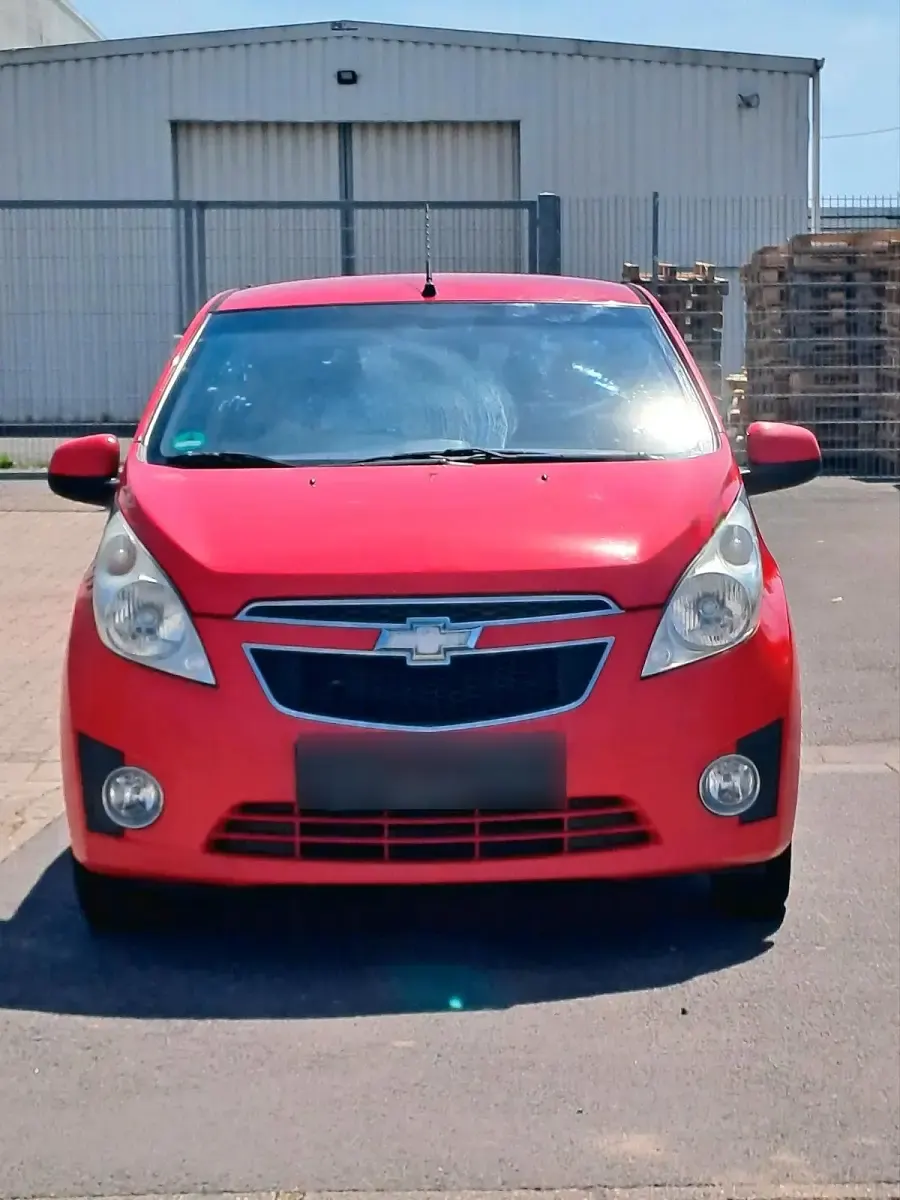 Second-hand Chevrolet Spark LS 68 CP (50 kW) 2011 Roșu Hatchback
