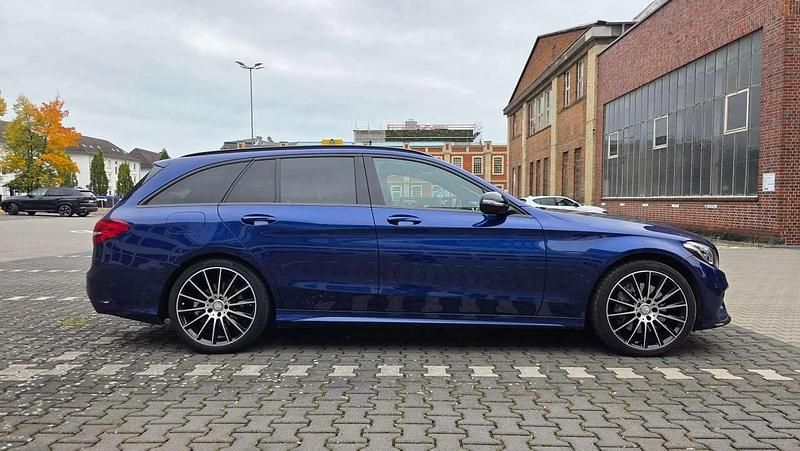 Blau Gebraucht 2015 Mercedes C400 AMG line Kombi | 23.050 € (Etwas zu teuer) - Bild 1/4
