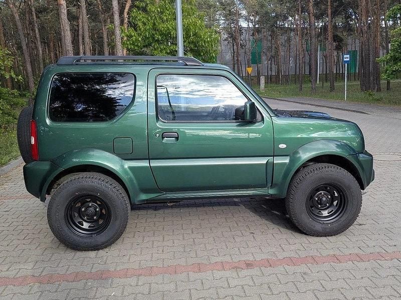 Grün Gebraucht 2013 Suzuki Jimny Comfort SUV | 11.500 € (Guter Preis) - Bild 1/4