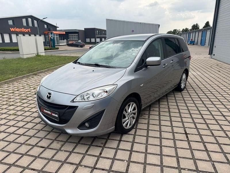 Grau Gebraucht 2011 Mazda 5 Center-Line Van / Kleinbus | 4.650 € (Etwas zu teuer) - Bild 1/4