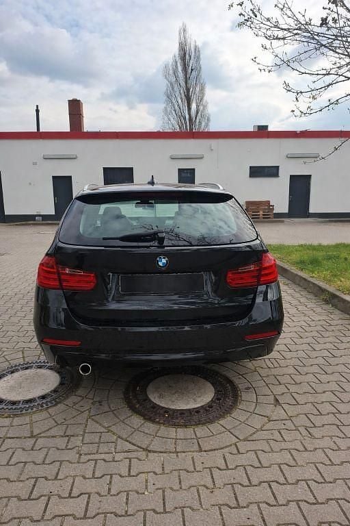 Second-hand BMW 318 143 CP (105 kW) 2014 Negru Break