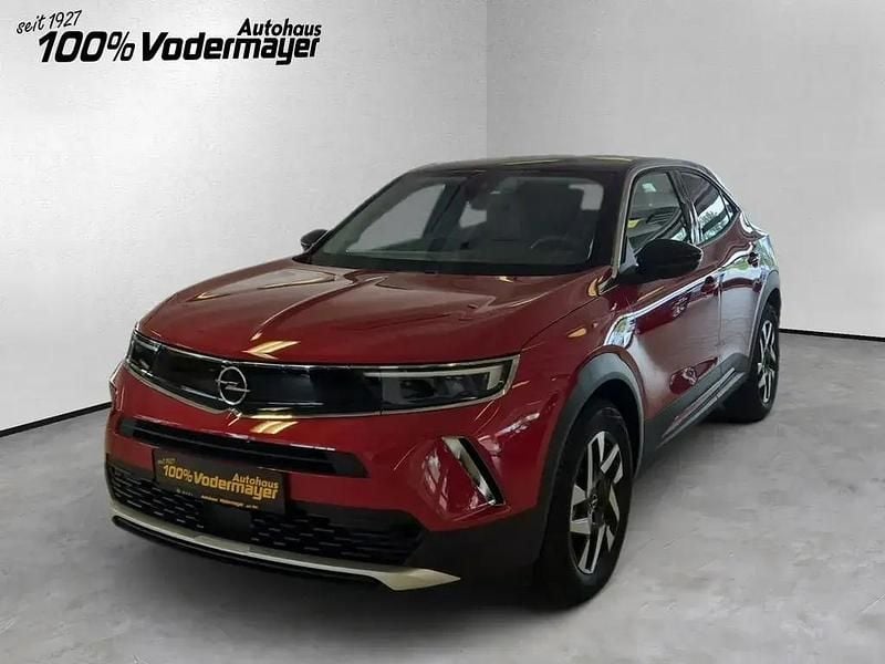 Power rot/kosmos rot Gebraucht 2023 Opel Mokka-e Elegance SUV | 26.990 € (Teuer) - Bild 1/4