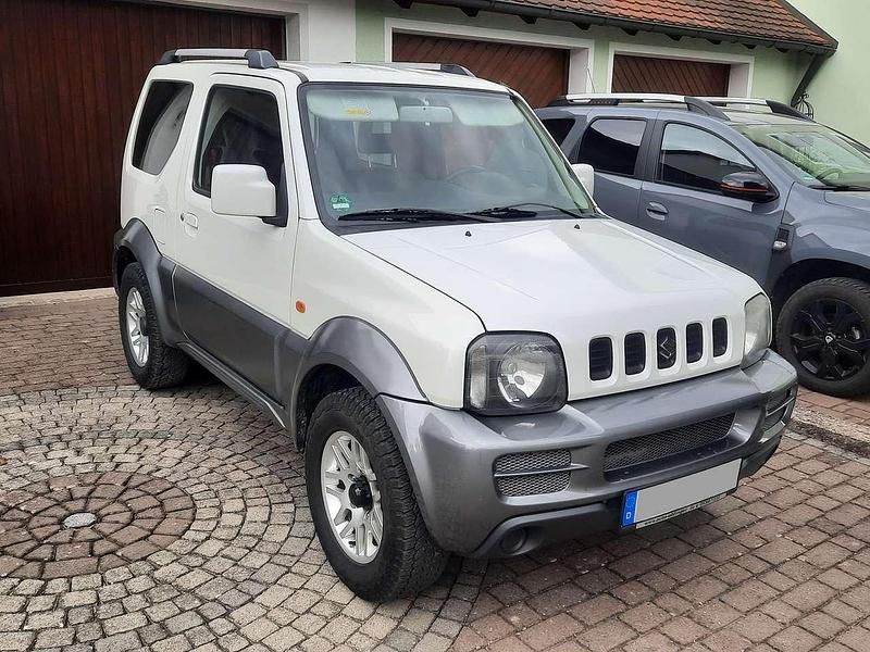 Weiß Gebraucht 2009 Suzuki Jimny Style SUV | 9.990 € (Etwas zu teuer) - Bild 1/4