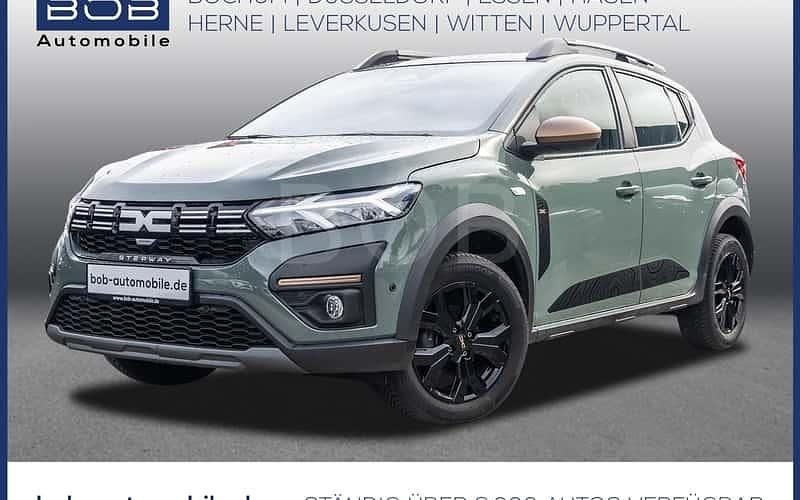 Grau Gebraucht 2024 Dacia Sandero Extreme Limousine | 18.410 € - Bild 1/4