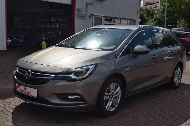 Braun Gebraucht 2016 Opel Astra Innovation Kombi | 7.390 € (Superpreis) - Bild 1/4