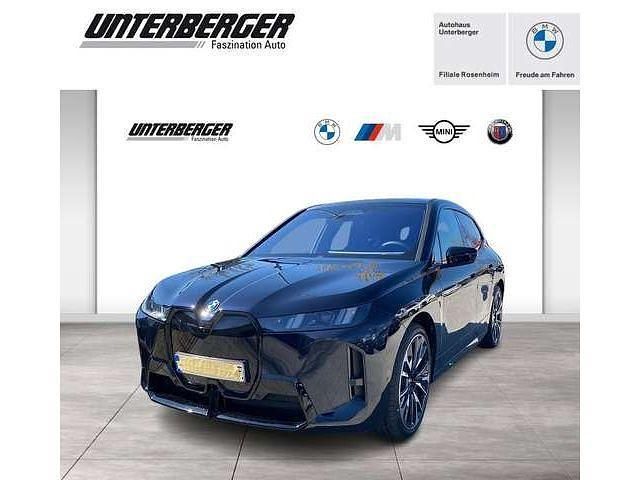 M carbonschwarz metallic Gebraucht 2025 BMW iX M Sport SUV | 106.990 € - Bild 1/4