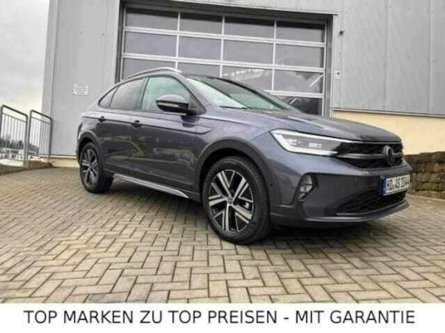 Grau Gebraucht 2022 VW Taigo Style SUV | 32.589 € (Teuer) - Bild 1/3