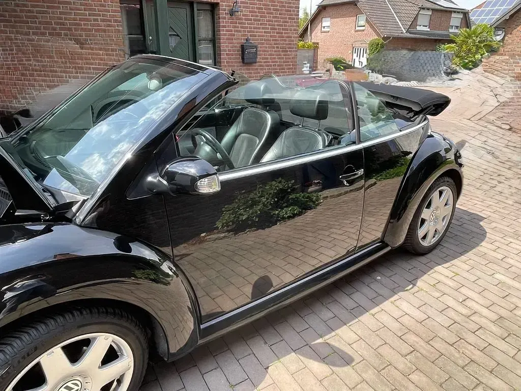 Gebraucht VW New Beetle Highline 116 PS (85 kW) 2004 Schwarz Kleinwagen