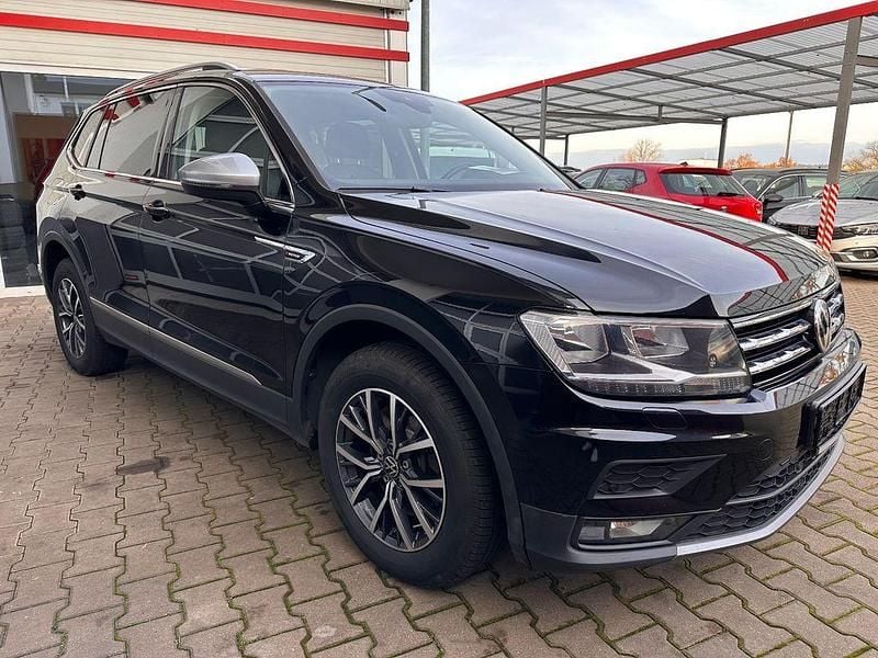 Schwarz Gebraucht 2021 VW Tiguan Allspace Comfortline SUV | 19.999 € - Bild 1/4
