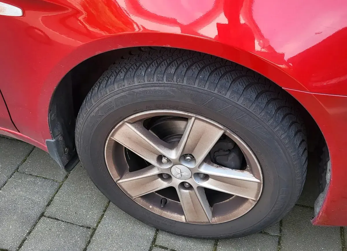 Gebraucht Mitsubishi Lancer 109 PS (80 kW) 2010 Rot Limousine