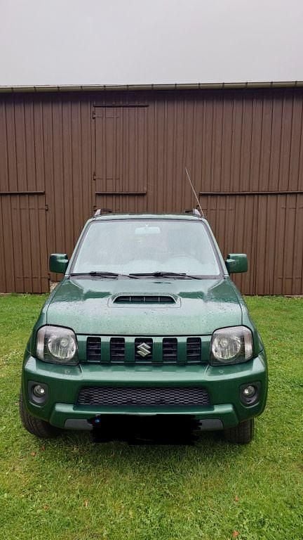 Grün Gebraucht 2014 Suzuki Jimny Comfort SUV | 8.499 € (Guter Preis) - Bild 1/4
