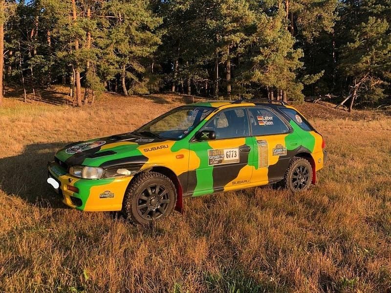 Grün Gebraucht 1998 Subaru Impreza SUV | 1.599 € - Bild 1/4